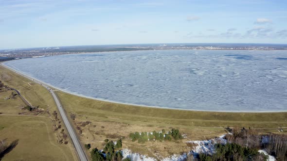 Aerial Winter View of the Huge Dam in Latvia Near City of Salaspils and Riga