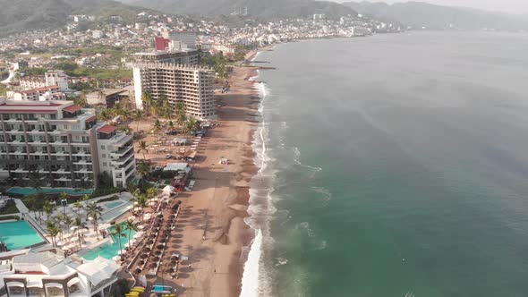 Aerial drone footage of the beautiful beach and coastal area of Puerto Vallarta in Mexico