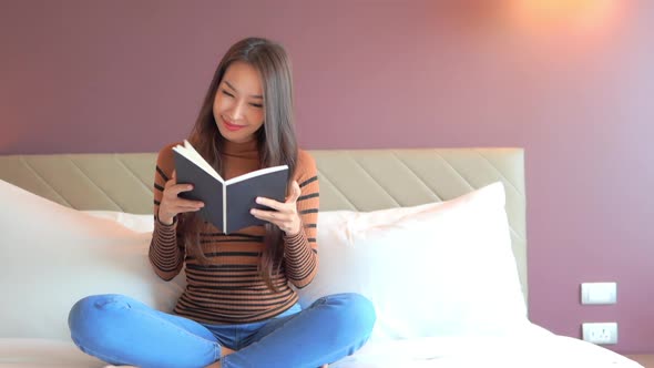 Young asian woman read book