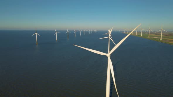 Windmill Park in the Ocean Drone Aerial View of Windmill Turbines Generating Green Energy Electric