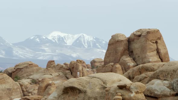 Sandstone layers with the La Sal Mountains