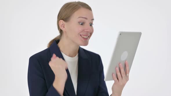 Young Businesswoman Celebrating Success on Tablet on White Background