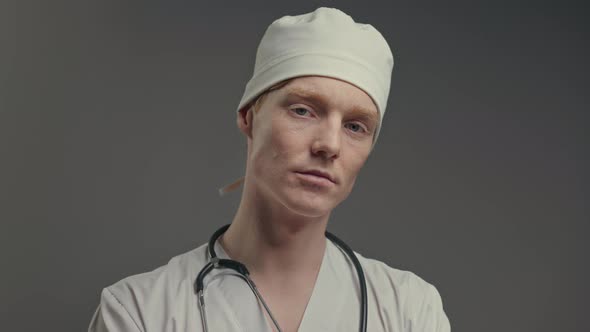 Face Of Young Doctor In White Hat