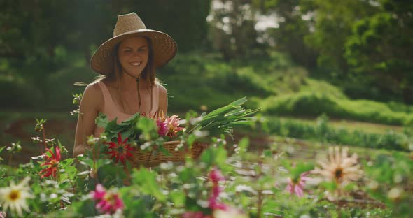Woman holding organic vegetables alt