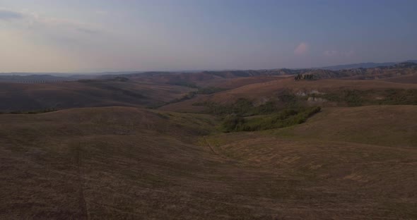 Aerial, Gorgeous Plowed Fields Landscape In Tuscany