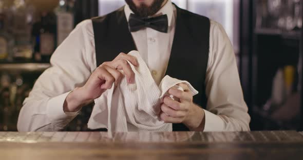 Bartender Is Wiping Glass Towel