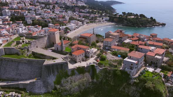 Drone with Camera Slowly Flies Over the Old European Resort Town of Ulcinj in Montenegro and Goes
