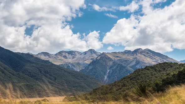 Clouds over Alpine Mountains Landscape in Wild Nature of New Zealand