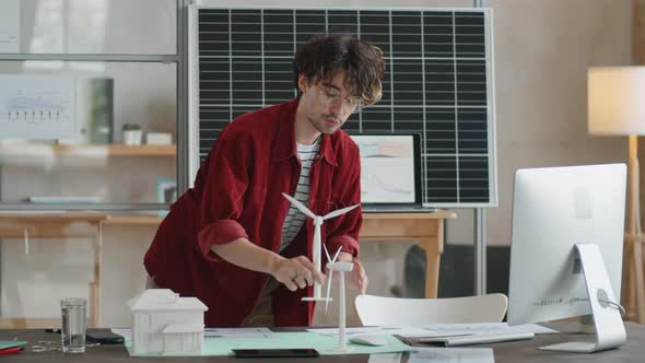 Male Engineer Discussing Project of Renewable Energy on Video Call