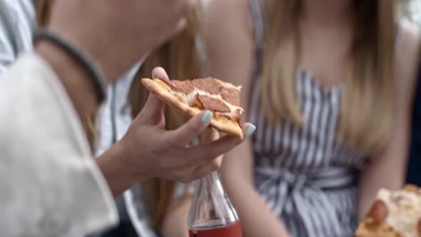  Hands Holding Pizza and Soda