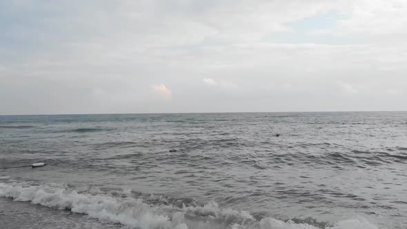 Drone View of Evening Mediterranean Waves Rolling To the Sandy Beach. Beautiful Turkish Nature.