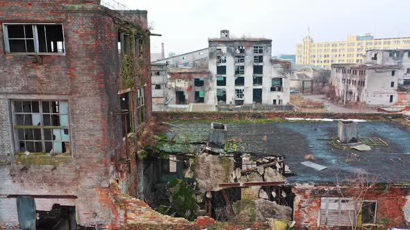 Abandoned industrial building. Ruins of an old factory. Aerial view