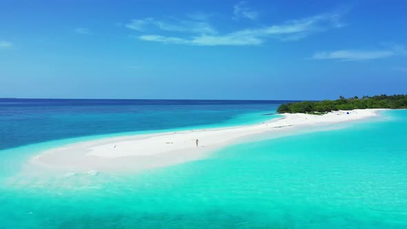 Aerial above panorama of paradise seashore beach journey by blue water with bright sand background o