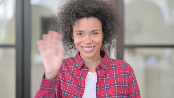 Portrait of African Woman Waving Welcoming