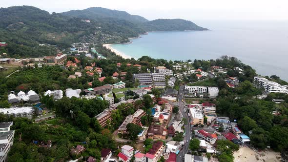 Aerial Drone Flying Over Hillside Resorts And Hotels Next To Kata Beach In Phuket. Dolly Forward, Es