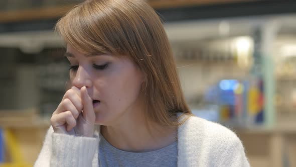 Portrait of  Young Woman Coughing, Throat infection