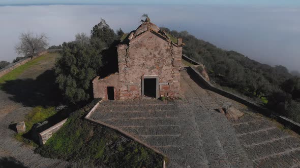 Drone pulling and tilting over Monsaraz Castle on the border of Portugal.