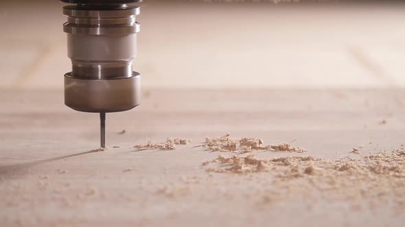 Concept of Production and Woodworking. Cutting Wood with a CNC Milling Machines