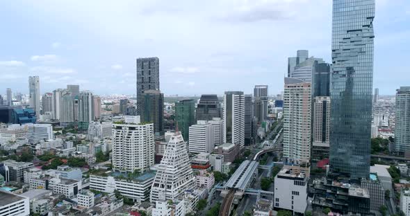 Aerial view of the BTS Station, Chong Nonsi and the tallest building in Bangkok: Maha Nakhon.