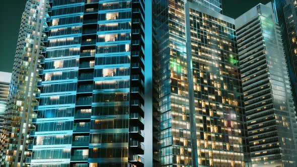 Aerial View of Glowing High Rise Buildings Big City alt