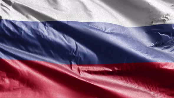 Russia textile flag waving on the wind. Slow motion. 20 seconds loop.