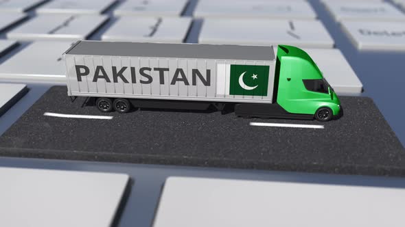 Truck with Flag of Pakistan Moves on the Keyboard Key