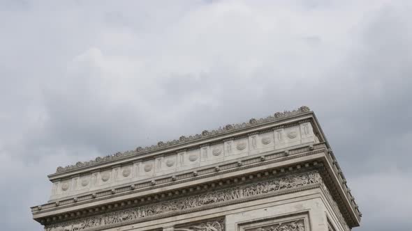Highly detailed surface of Arch of Triumph in Paris France in front of cloudy sky 4K 3840X2160 30fps