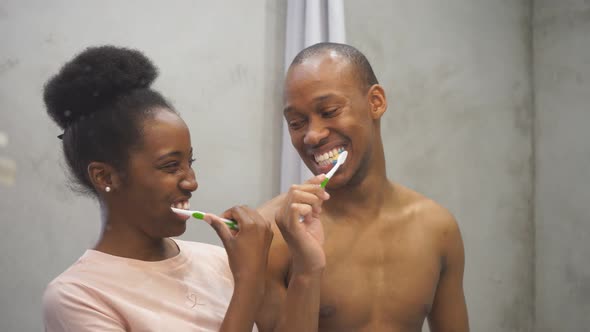 Happy African Couple in Bathroom