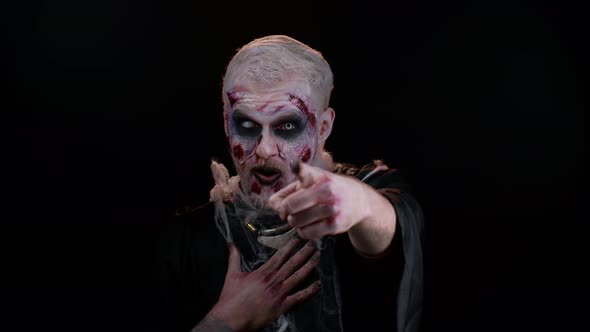 Halloween Zombie Man Pointing Finger to Camera Laughing Out Loud Taunting Making Fun Funny Joke