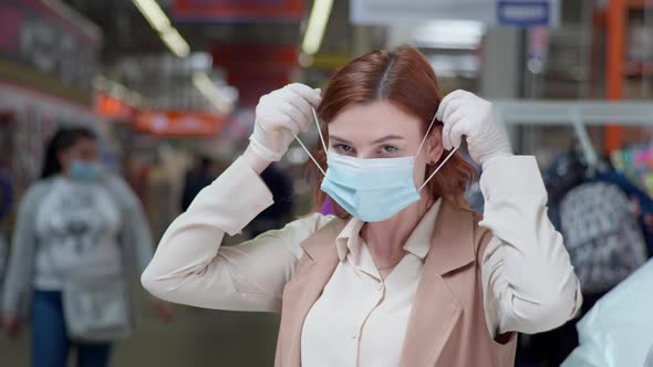 Shopping on Coronavirus, Woman Buyer Wearing a Mask and Gloves While Shopping in Quarantine Because