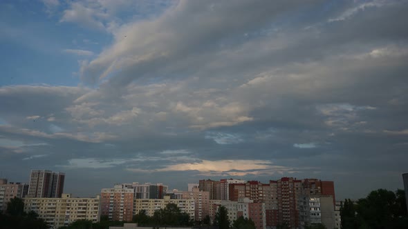 Urban Landscape the Transition From Evening To Night Video. Beautiful Rainy Clouds Pass