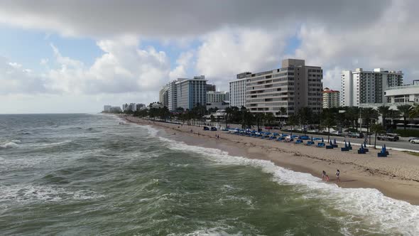 Fort Lauderdale city in florida shoreline ocean waves sunny afternoon