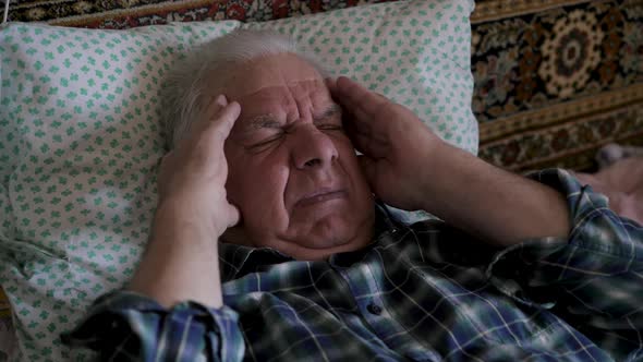 Headaches Sharp Pains Migraine Blood Pressure In Elderly Gray Haired Man