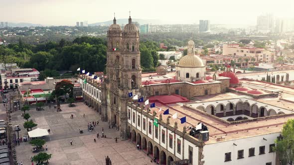 Drone flight over Plaza de las Americas with the Basilica of Zapopan