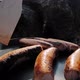 Woman Cooks Sausages at Camping - VideoHive Item for Sale
