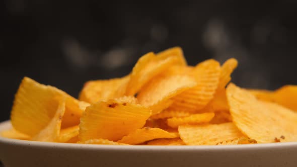 potato chips into plate