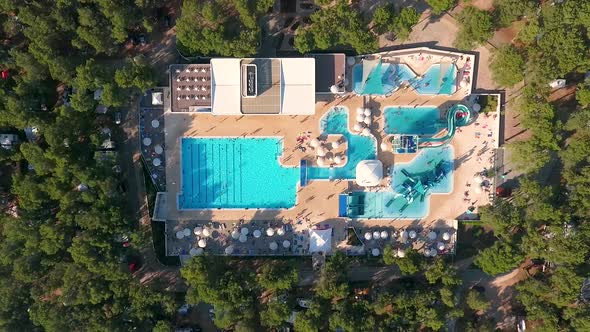 Aerial view above of aquapark full of people, Mali Losinj, Croatia.