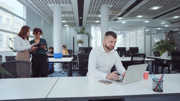 Businessman Disagreeing with Partner During Online Communication