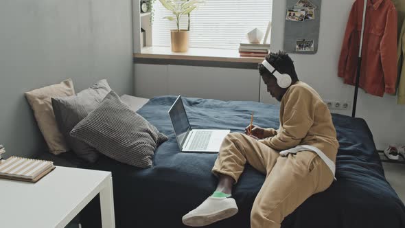 African American Man Having Online Lesson at Home