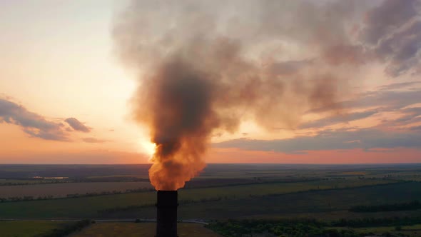 Aerial View. Pipes Throwing Smoke in the Sky. Air Pollution From Industrial Plants