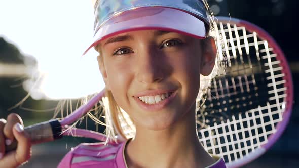 Handsome Young Woman Looking to the Camera and Smiling