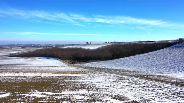 Winterly In Rural Landscape Near Zistersdorf In Weinviertel, Lower Austria. Aerial Pullback