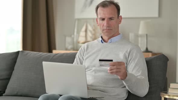 Middle Aged Businessman with Online Payment Failure on Smartphone 
