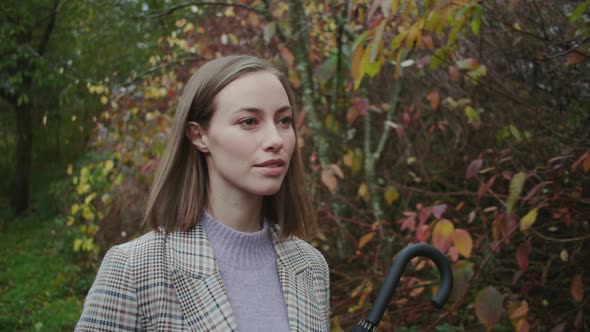 Beautiful Young Woman Walking In Countryside