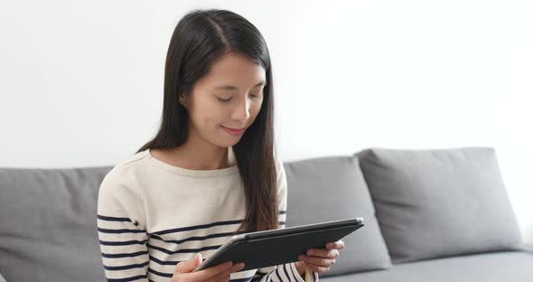 Woman look at tablet computer