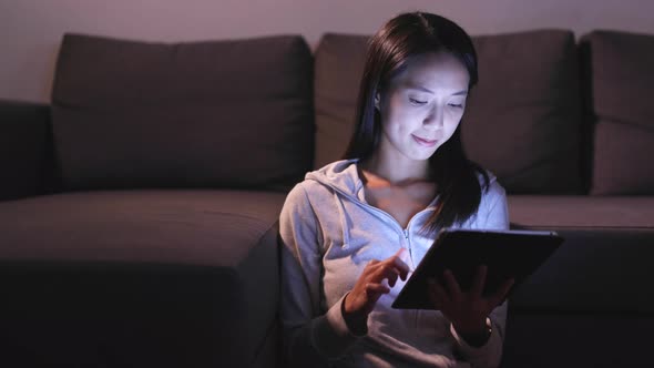 Woman use of digital tablet at home 