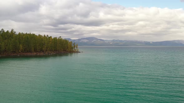 Aerial view over Lake khovsgol and forest bank in daytime