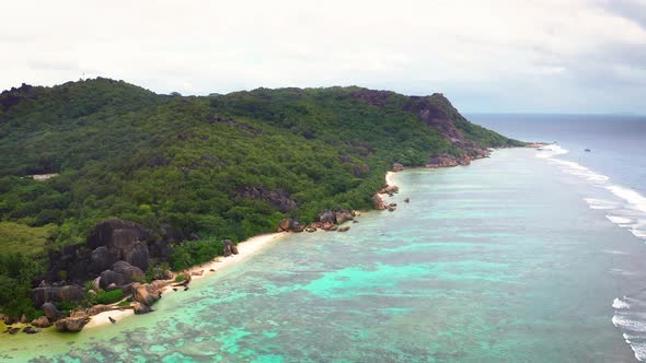 Flying Above Anse Source D'argent Beach at the La Digue Island Seychelles