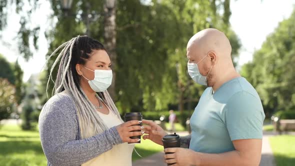 Two Friends Meet, Drink Coffee, Put Off Medical Mask, Deeply Breath and Celebrate End of Pandemic