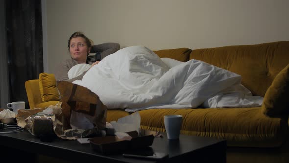 Girl On Couch Watching TV